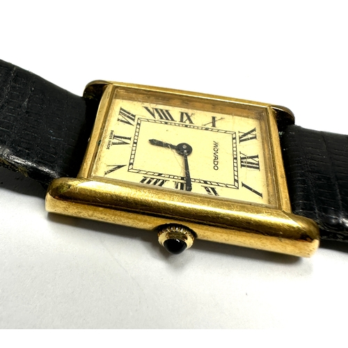 477 - Vintage gents Movado gold tone tank wrist watch hand winding the watch is ticking black leather stra... 