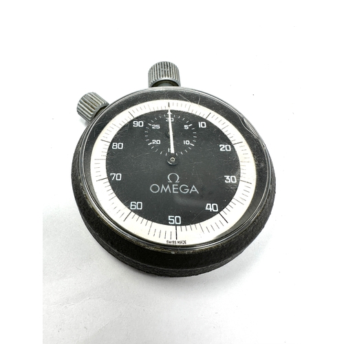 493 - Vintage Omega 100 second stopwatch cal 8300a the watch is working works and resets chip to glass age... 