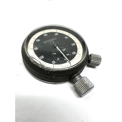 493 - Vintage Omega 100 second stopwatch cal 8300a the watch is working works and resets chip to glass age... 