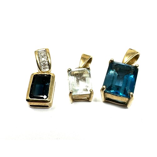 347 - 3 X 9ct Gold Gemstone Set Pendants Inc. Topaz, Aquamarine, Sapphire And Diamond (5.3g)