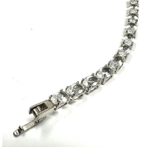 154 - 9ct White Gold Goshenite Set Tennis Bracelet (9.5g)