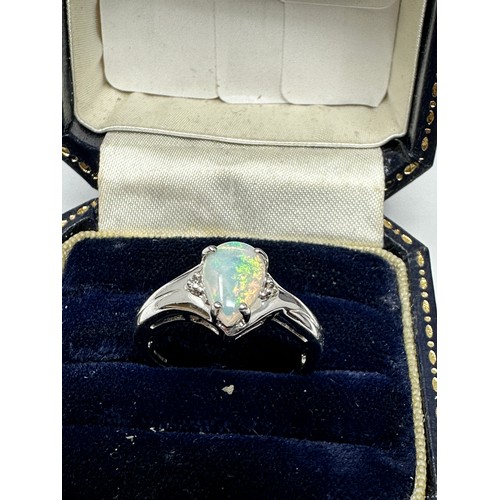 261 - 9ct White Gold Diamond And Opal  Ring (3.1g)