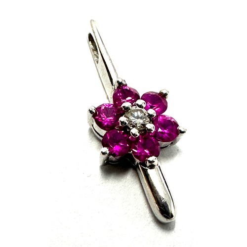 242 - 9ct White Gold Diamond And Ruby  Pendant (1.2g)