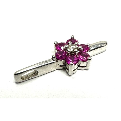 242 - 9ct White Gold Diamond And Ruby  Pendant (1.2g)