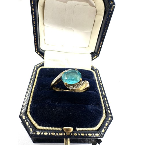 183 - 9ct Gold Blue Topaz  Ring With Diamond Accents (2.7g)