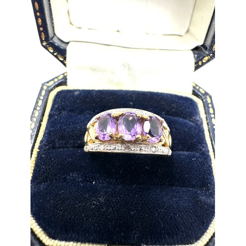 195 - 9ct Gold Diamond And Amethyst Ring (3.8g)