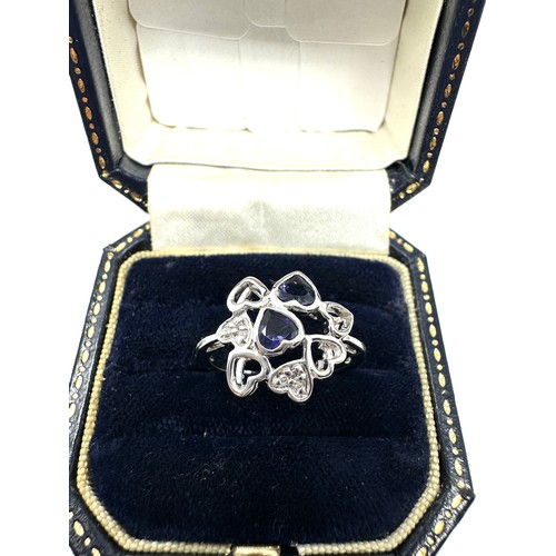 197 - 9ct White Gold Diamond And Iolite  Ring (2.9g)