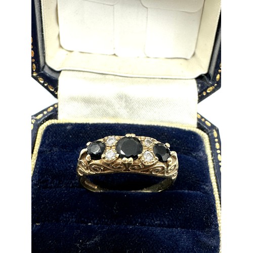 243 - 9ct Gold Sapphire And Cz  Ring (3.1g)