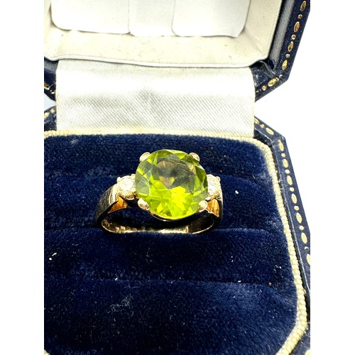 199 - 18ct Gold Diamond And Peridot  Ring (4.1g)