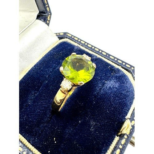 199 - 18ct Gold Diamond And Peridot  Ring (4.1g)