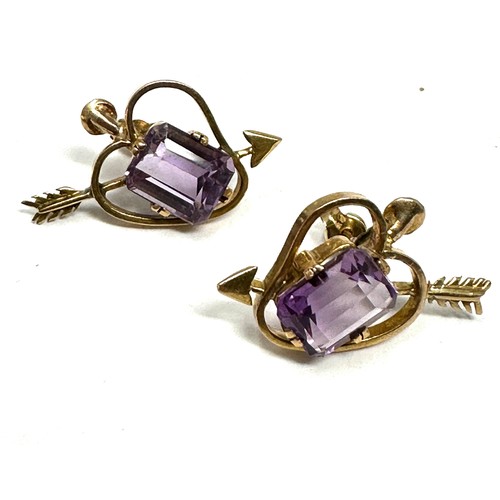 273 - 9ct Gold Amethyst Emerald Cut Arrow Pierced Heart Openwork Stud Earrings (4.9g)