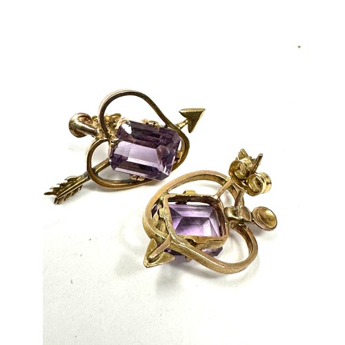 273 - 9ct Gold Amethyst Emerald Cut Arrow Pierced Heart Openwork Stud Earrings (4.9g)