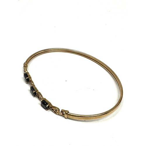 248 - 9ct Gold Diamond And Sapphire Heart Details  Bangle Bracelet (4.4g)