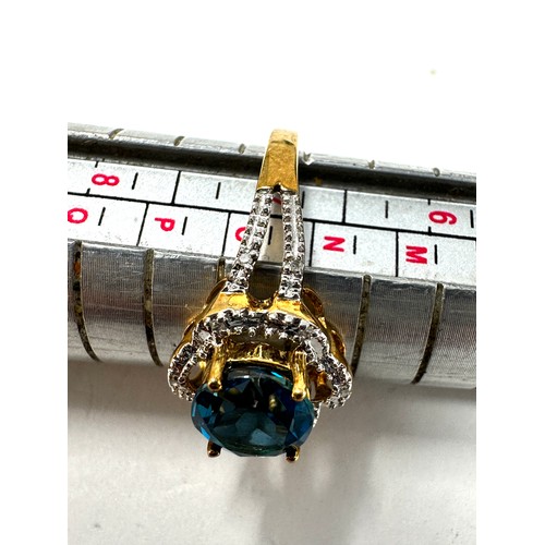 228 - 9ct  Gold Diamond And Topaz  Ring (2.5g)