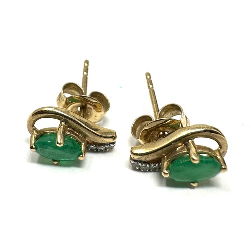 276 - 9ct  Gold Diamond And Emerald Earrings (1.1g)