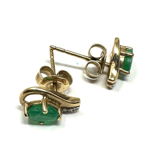 276 - 9ct  Gold Diamond And Emerald Earrings (1.1g)