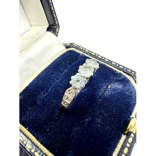 325 - 9ct White Gold Blue Topaz  Ring With Diamond shoulders (2.6g)