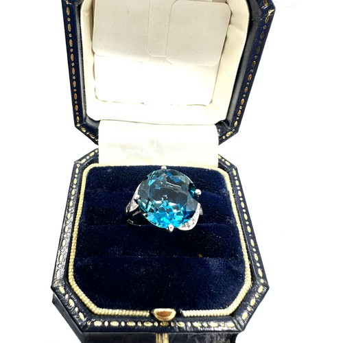 211 - 9ct White Gold Diamond And Topaz  Ring (4.6g)