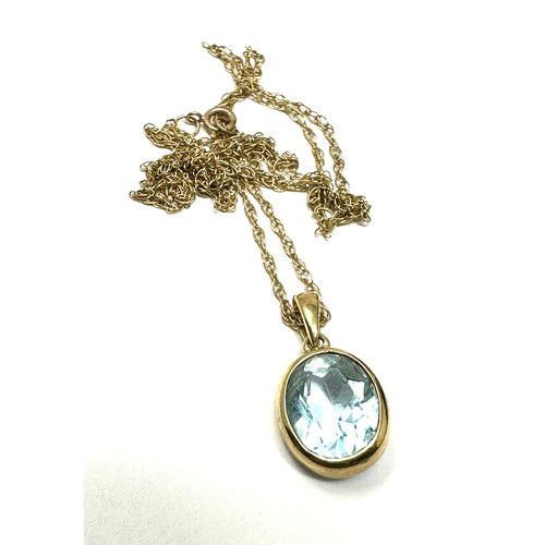 185 - 9ct Gold Blue Topaz Pendant Necklace (2.3g)