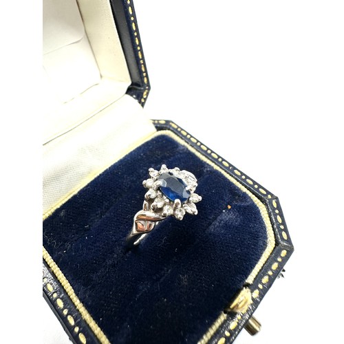 329 - 9ct White Gold Diamond & Sapphire Oval Cluster Ring (2.7g)