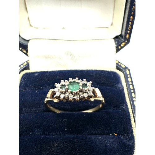 339 - 9ct Gold Emerald Three Stone Ring With Diamond Surrounds (1.5g)