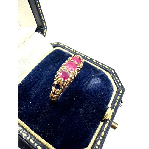 304 - 9ct Gold Ruby Three Stone Ring (2.2g)