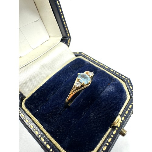 335 - 9ct Gold Diamond & Blue Synthetic Spinel Three Stone Ring (2g)