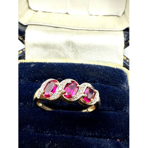 309 - 9ct Gold Diamond & Synthetic Ruby Dress Ring (2g)