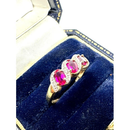 309 - 9ct Gold Diamond & Synthetic Ruby Dress Ring (2g)