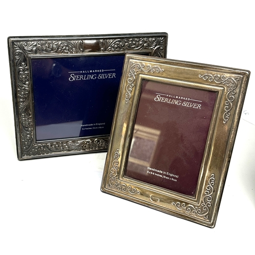 85 - 2 silver picture frames largest measure approx 22cm by 17cm