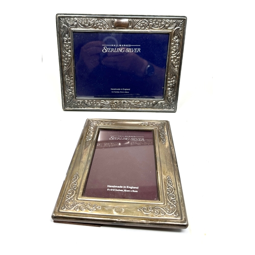 85 - 2 silver picture frames largest measure approx 22cm by 17cm