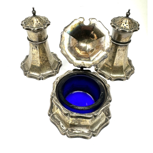 81 - Silver cruet set Birmingham silver hallmarks blue glass liner