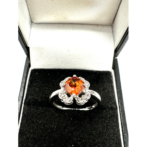 274 - 9ct white gold diamond and orange gemstone  ring (3.7g)