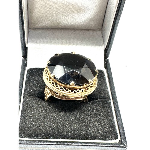 251 - Large 9ct gold smoky quartz ring (9.8g)