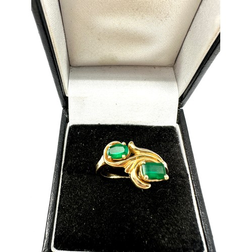 289 - 14ct gold synthetic emerald ring (3.8g)