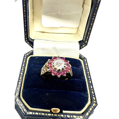 147 - 9ct gold diamond & ruby ring (5g)