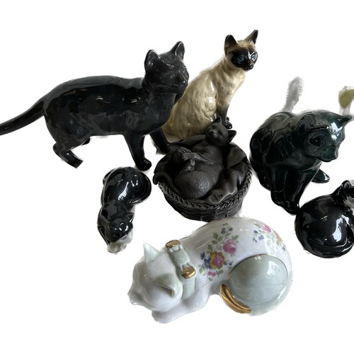 61 - Selection of pottery animal ornaments to include cats, chicken etc