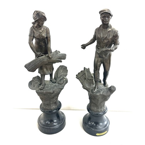 297 - Pair of metal figures on base, L