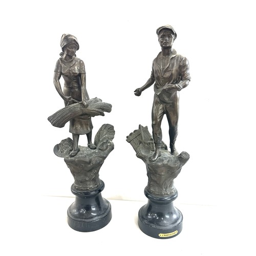 297 - Pair of metal figures on base, L