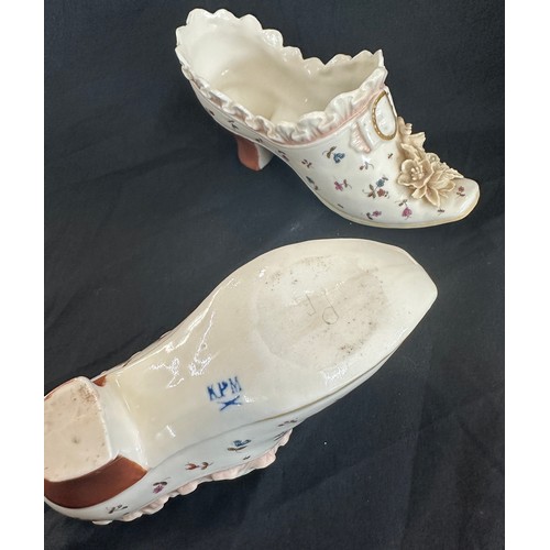 85 - Meissen pottery boots + 2 others, has sustained damage