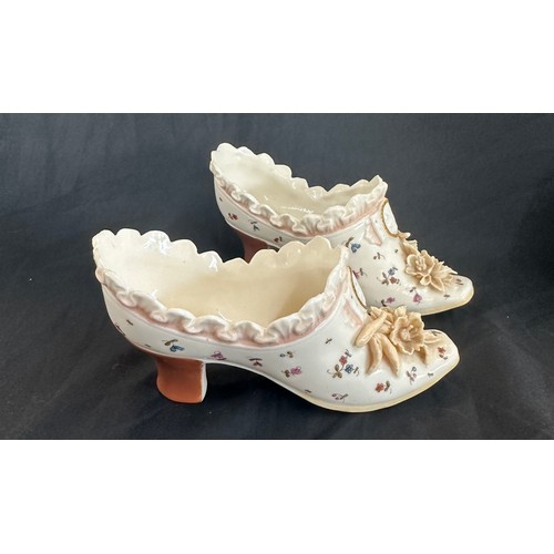 85 - Meissen pottery boots + 2 others, has sustained damage