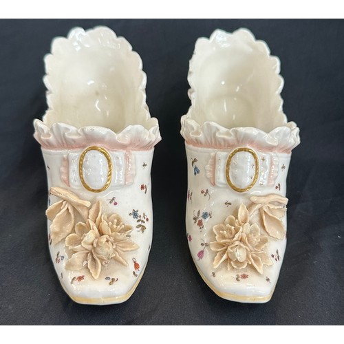 85 - Meissen pottery boots + 2 others, has sustained damage