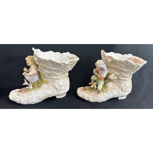 85 - Meissen pottery boots + 2 others, has sustained damage