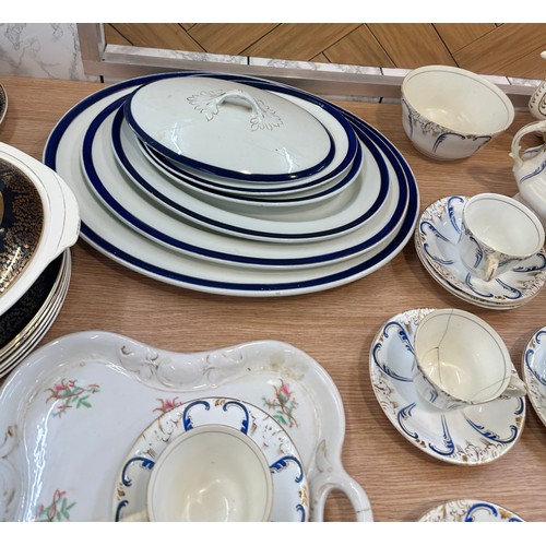 289 - Large selection of part tea and dinner services one hand painted to include meat trays, cups, saucer... 