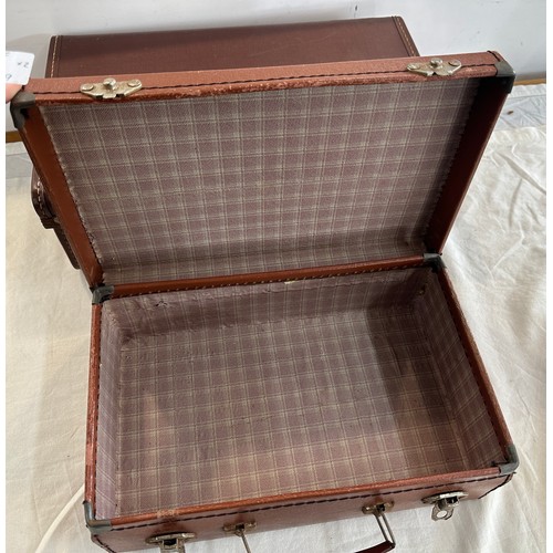 272 - Two vintage leather briefcases largest measures approx 16 inches wide by 5.5 inches tall