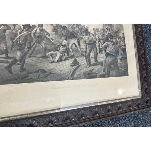 301 - Two prints in carved frames depicting ' Nelson at The Battle of Trafalgar' and ' Wellington at the B... 