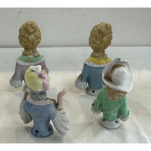 413 - Four vintage porcelain lady pin cushion tops all signed