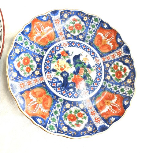 35 - Two hand painted oriental plates both with marks to base largest measures 10 inches diameter