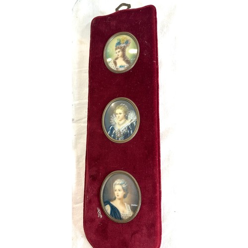 120 - Three reproduction copies of hand painted miniatures on a sash