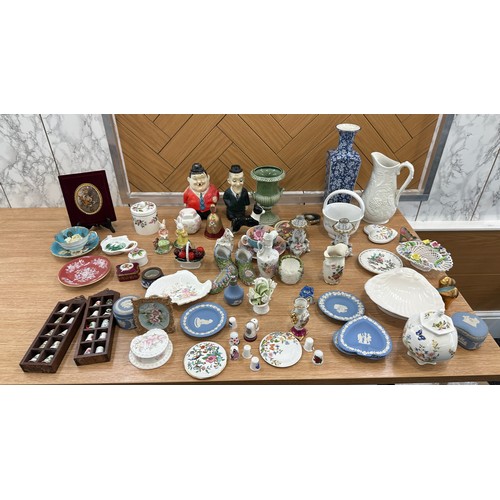 157 - Large selection of assorted pottery items to include figures, vases, trinkets etc